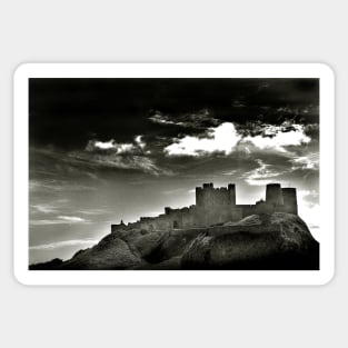 Dark clouds over Bamburgh Castle - Northumberland, UK Sticker